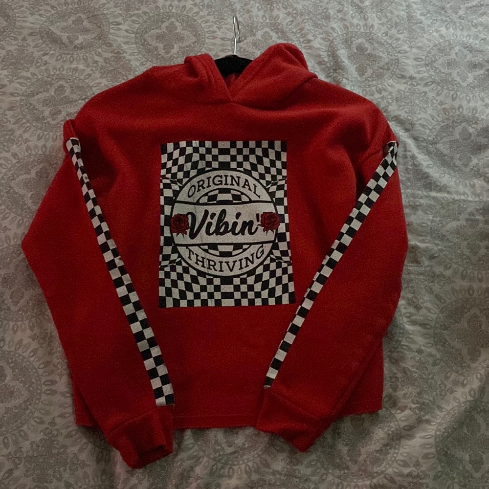 Red hoodie with lovely design in the front